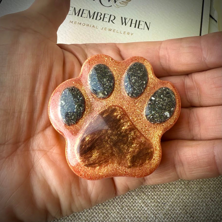 Paw paperweight